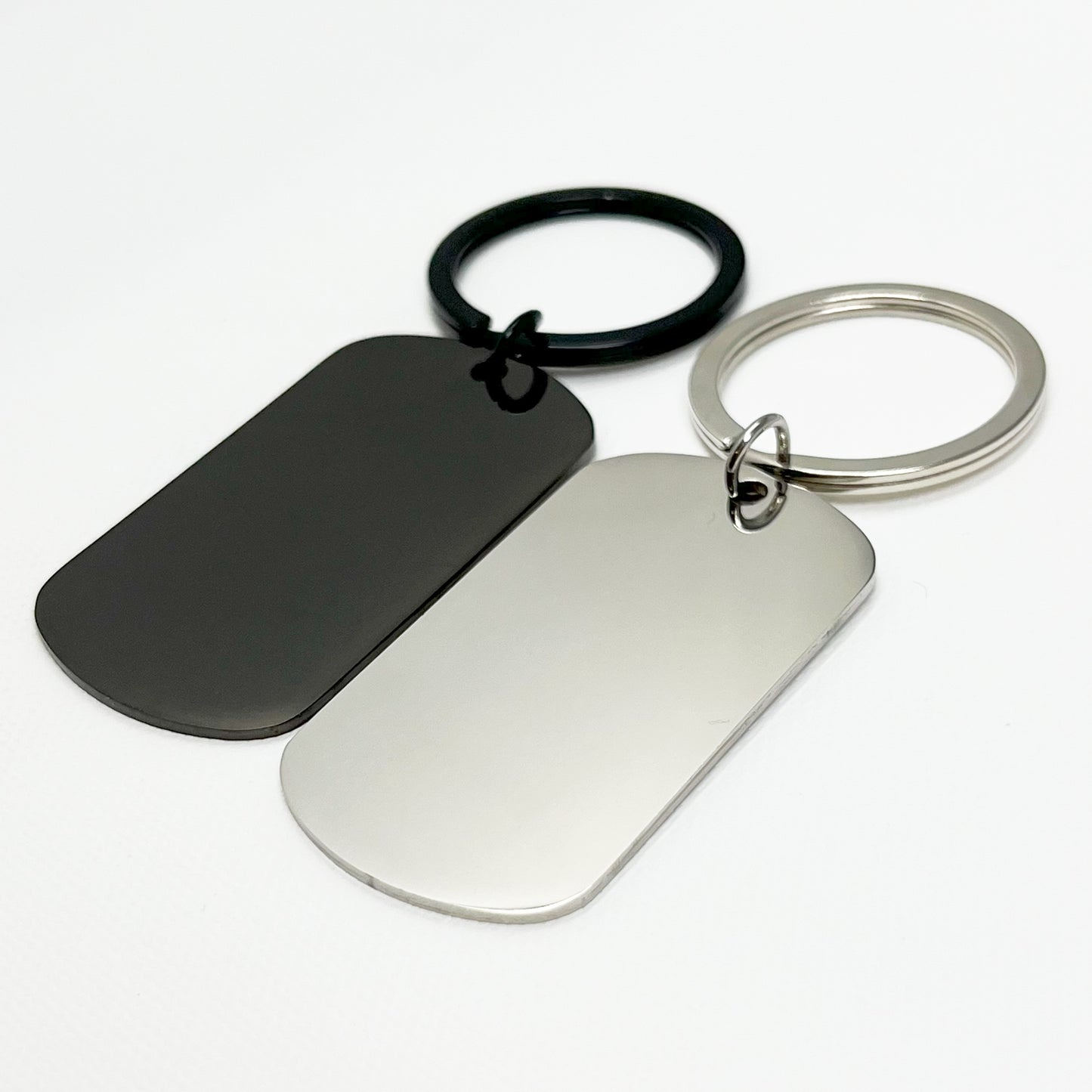 Modern black and silver keychain set displayed in an elegant black gift box β Unique gift idea