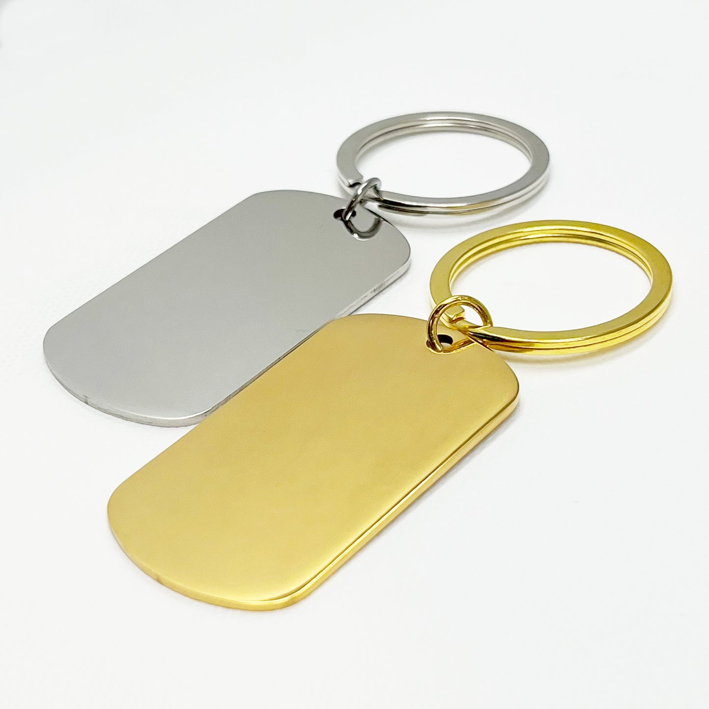 Refined silver and gold keychains in a premium display β Perfect for a memorable gift