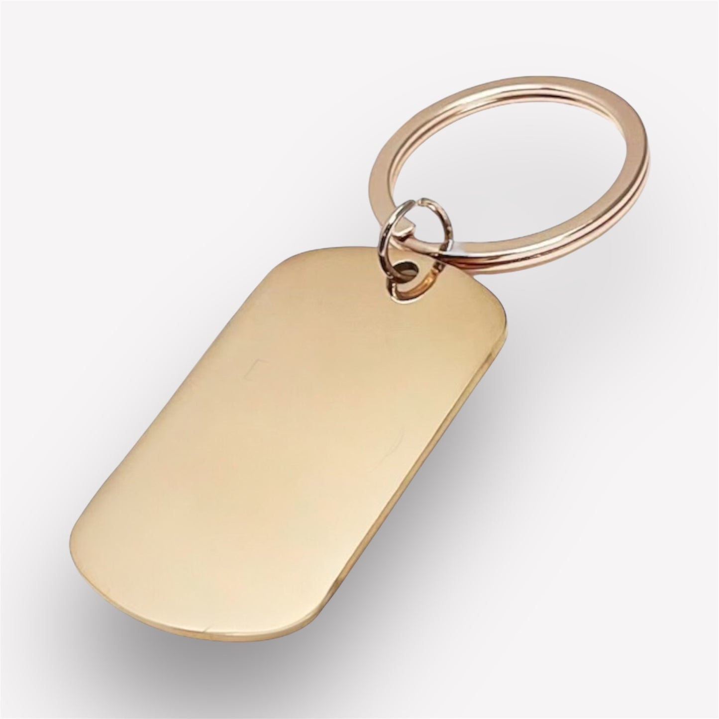 Rose gold oval keychain with engraved image and calendar β Elegant personalised gift with photo and special date