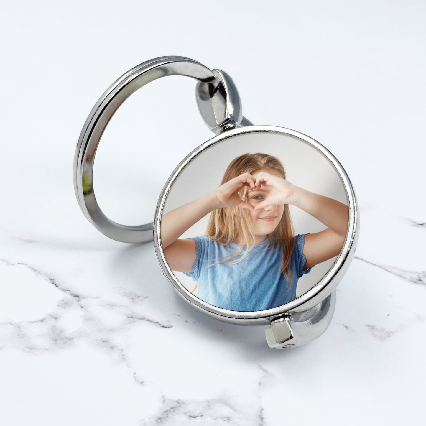 Spinning Silver Round Keyring – A Unique Keepsake in Motion