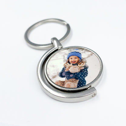 Spinning Silver Round Keyring – A Unique Keepsake in Motion