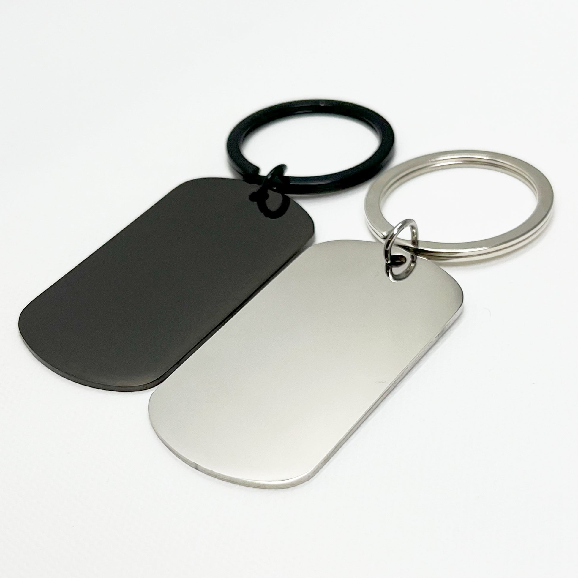 Modern black and silver keychain set displayed in an elegant black gift box – Unique gift idea